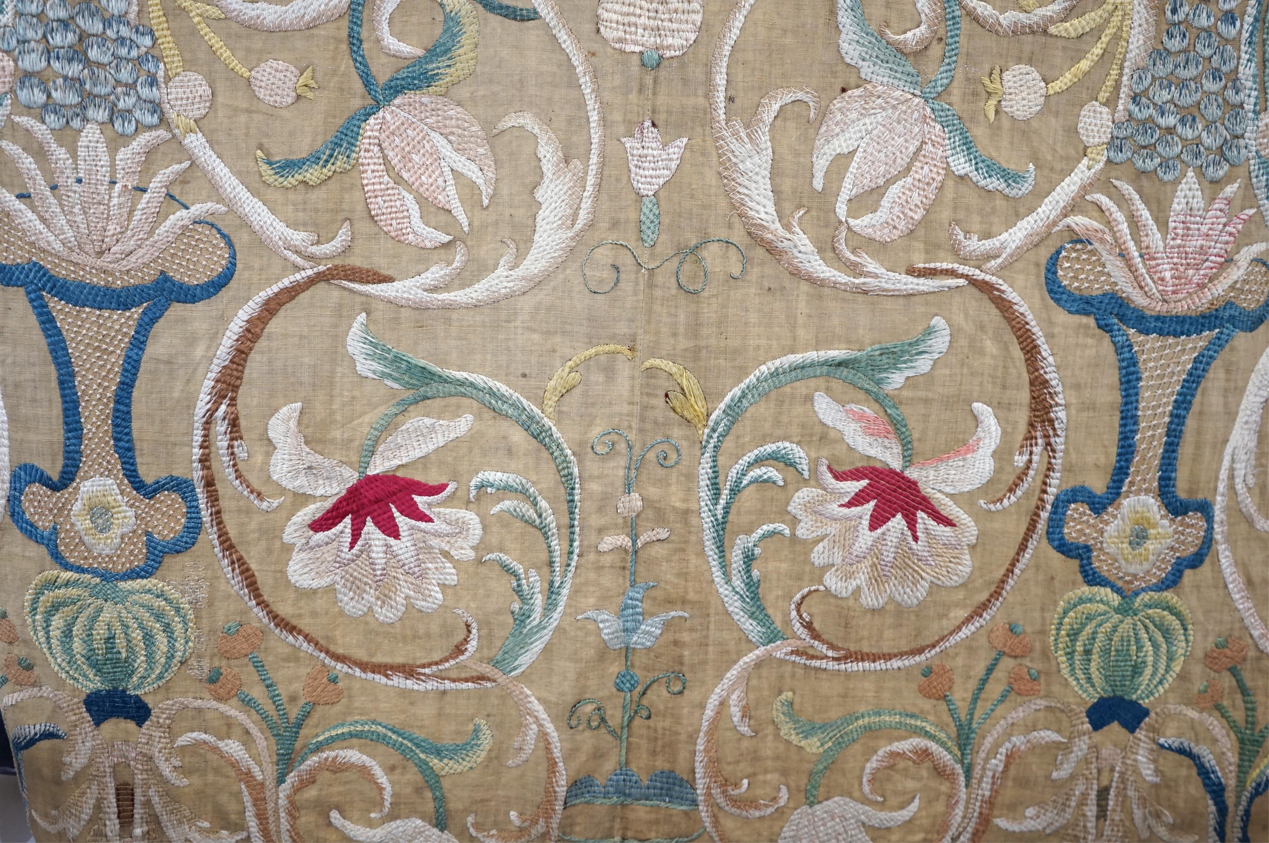 A large pair and one smaller panel of late 18th century Italian silk floss hand embroidered panels, possibly from Florence or Venice, both known for floss embroidery. Thought to be originally sacristy hangings. Elaborate